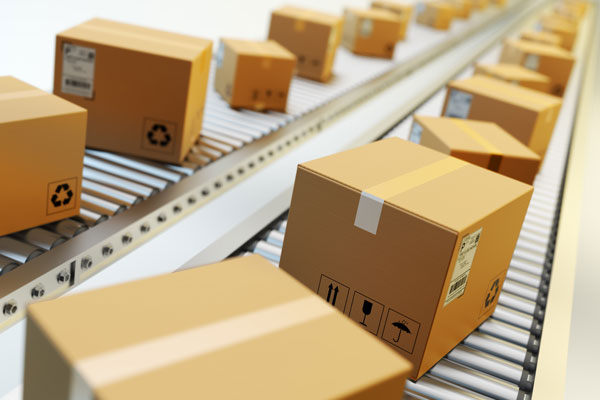 fulfillment operations - packages on a conveyor belt