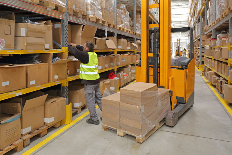 Worker returning products to a fulfillment center