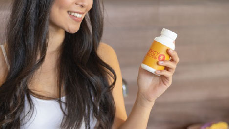 woman with vitamins from health fulfillment
